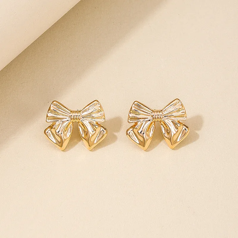 Elegant Vienna Verve Metal Bow Women's Earrings