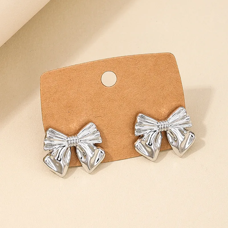 Elegant Vienna Verve Metal Bow Women's Earrings