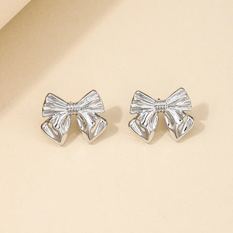 Elegant Vienna Verve Metal Bow Women's Earrings