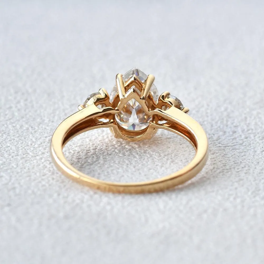 Pear Shaped Moissanite Three Stone Ring