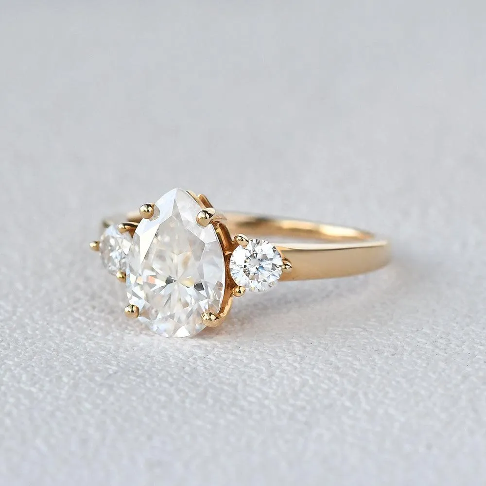 Pear Shaped Moissanite Three Stone Ring