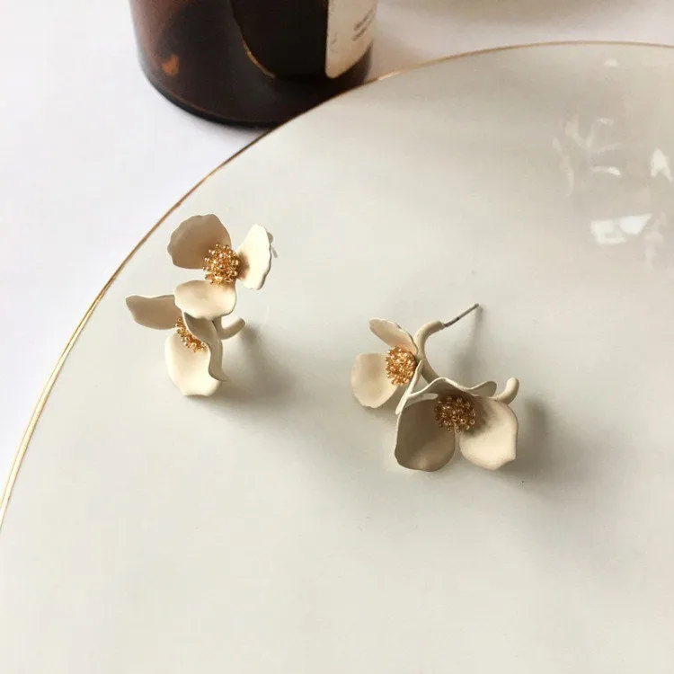 White Cloves studs